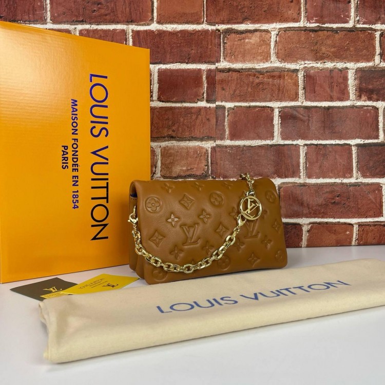 LOUİS VUİTTON POCHETTE COUSSİN BAG EMPREİNTE TABA
